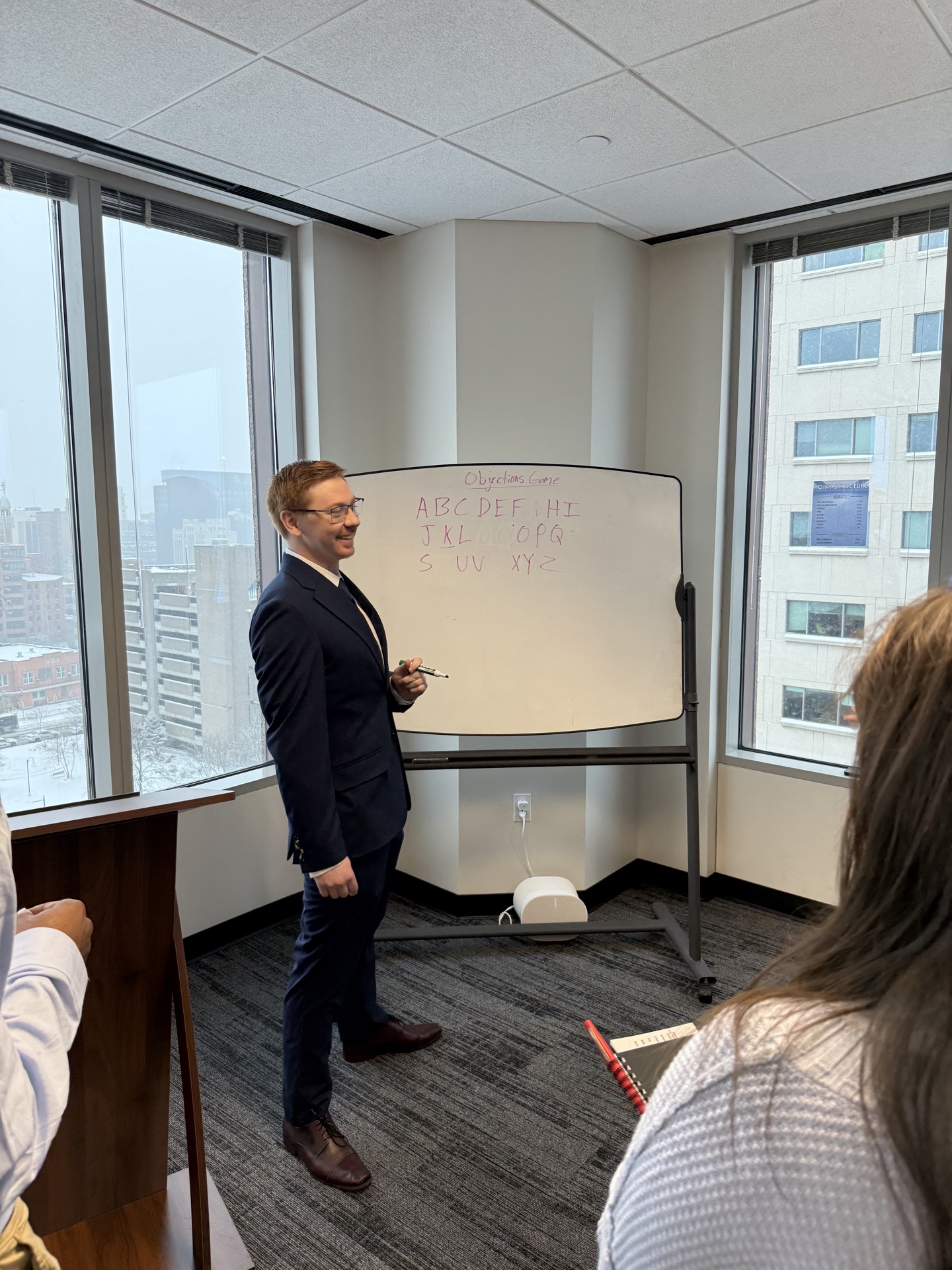 Tiber and Laurel training session with whiteboard in Rochester office